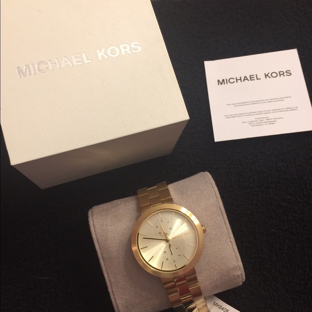 Michael Kors woman’s MK6408 watch gold-tone
